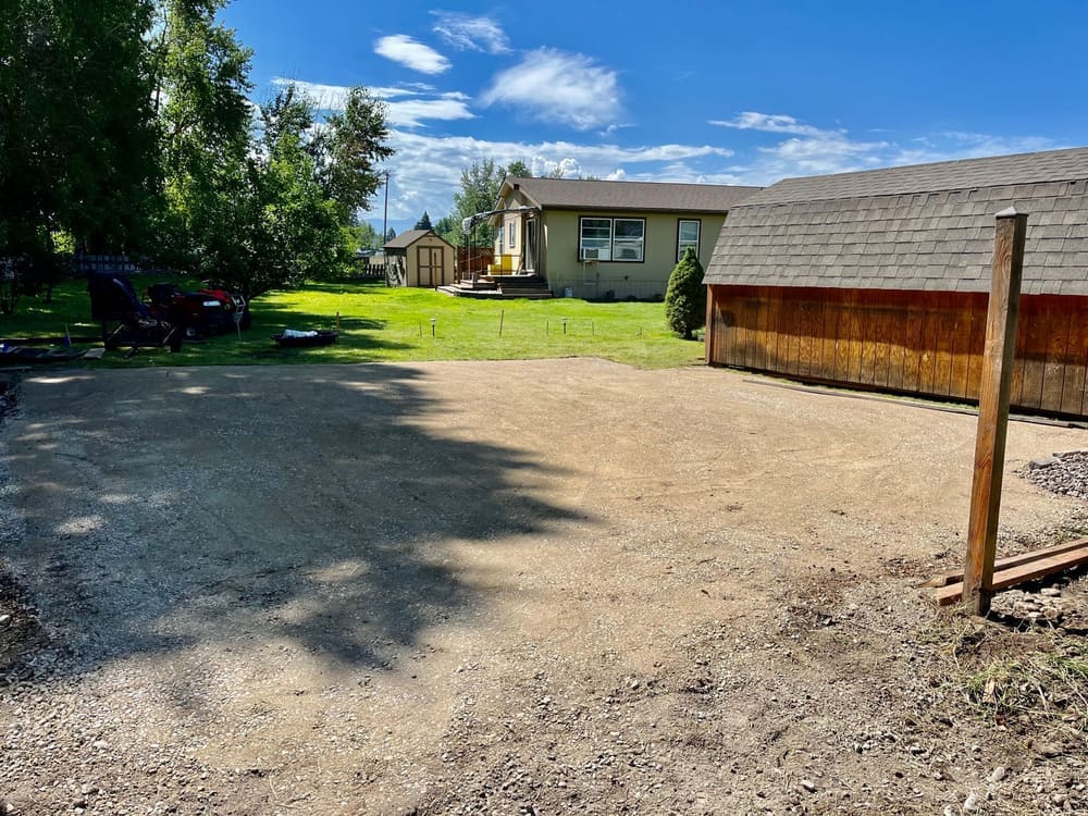Relocated an old shed and prepped a gravel pad for a new structure