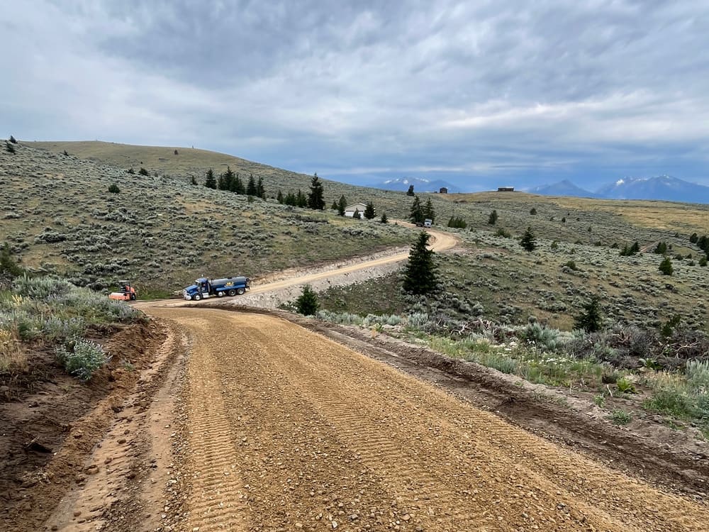 Gravel road built through the hills